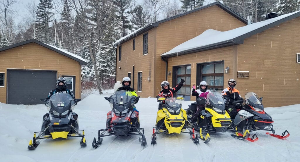 Craig Nicholson and his snowmobile friends at La Bannik in Abitibi-Témiscamingue